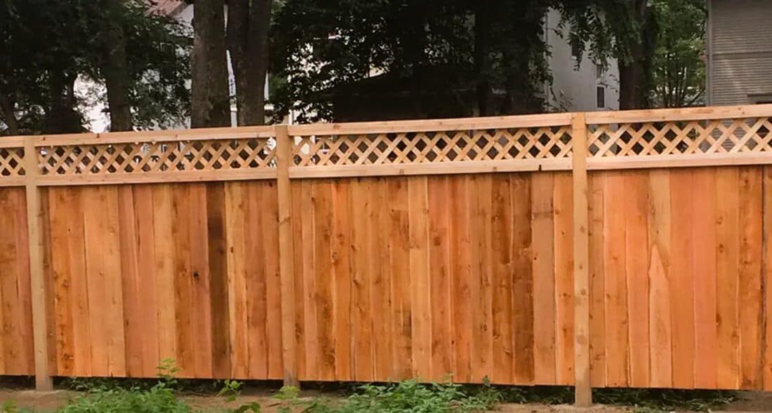 Extraordinaire Fence - 6' Cedar with Lattice Top install in Sioux Falls
