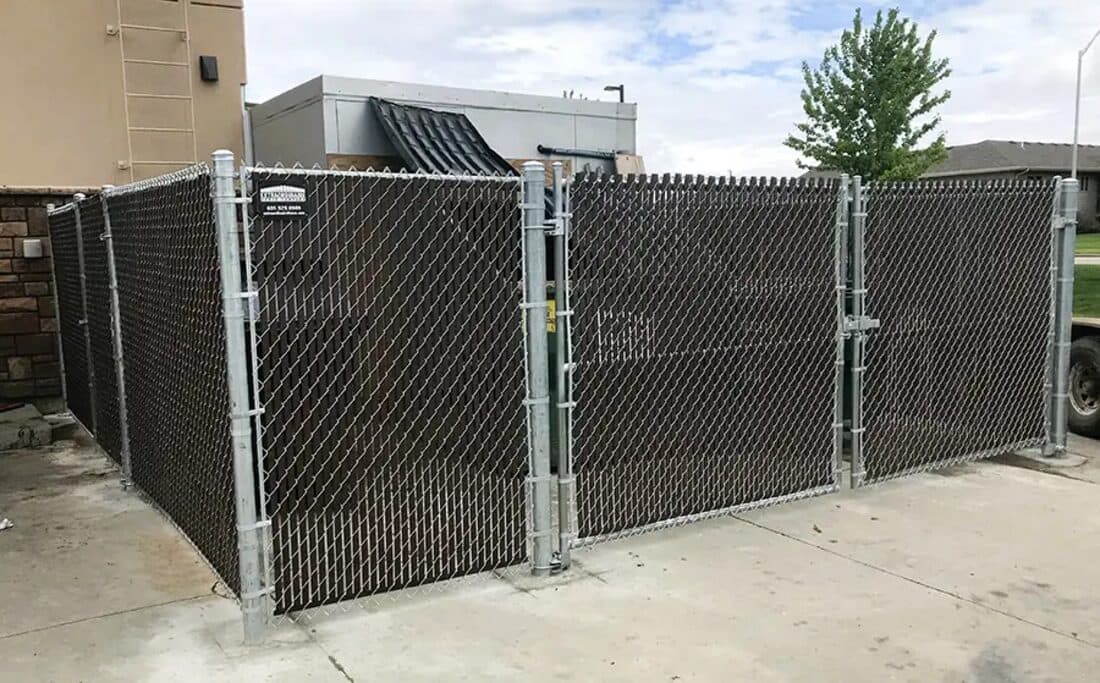 Extraordinaire Fence - Slat Enclosure install in Sioux Falls