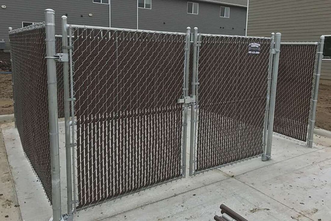 Extraordinaire Fence - Commercial Enclosure install in Sioux Falls